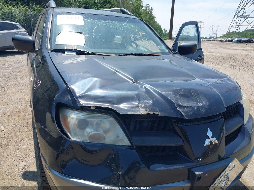 JA4LZ31F06U001202 2006 MITSUBISHI OUTLANDER photo no. 6