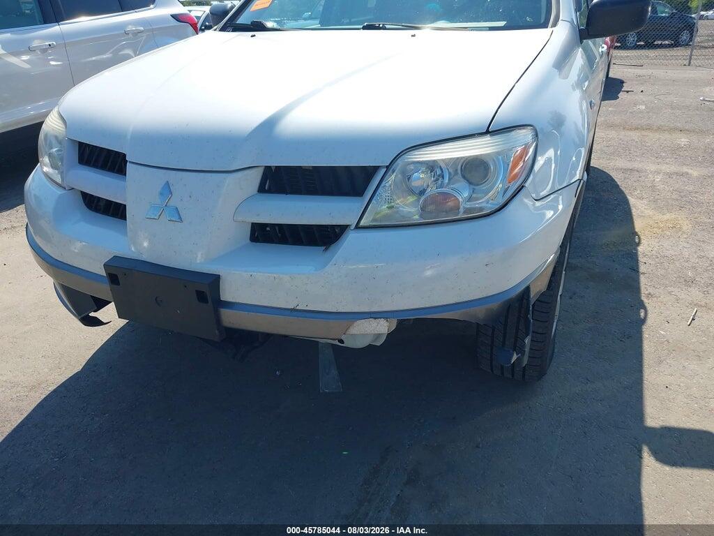 JA4LZ31F16U035696 2006 MITSUBISHI OUTLANDER photo no. 6
