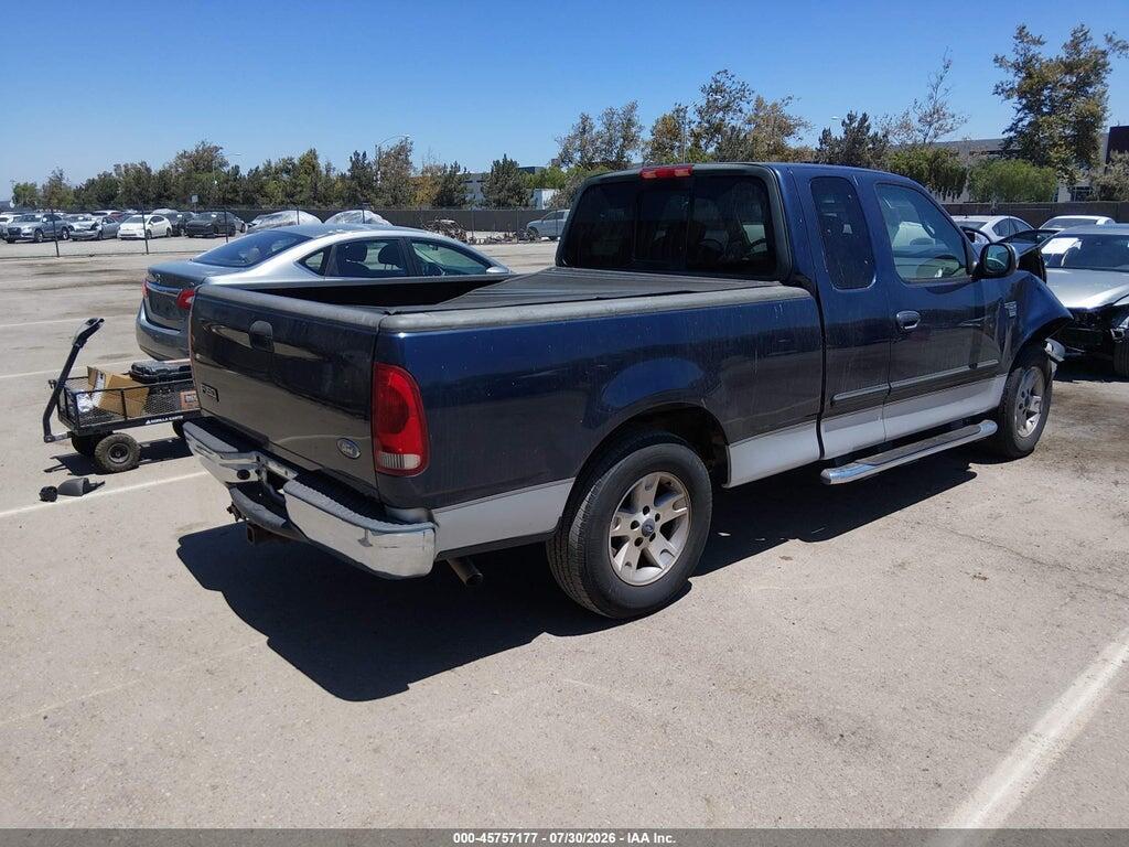 2FTRX17W32CA28910 2002 FORD F-150 photo no. 4