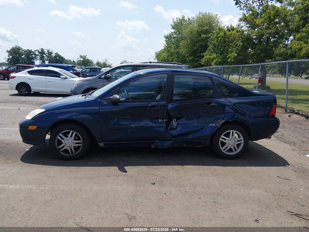 1FAFP34342W262444 2002 FORD FOCUS photo no. 6