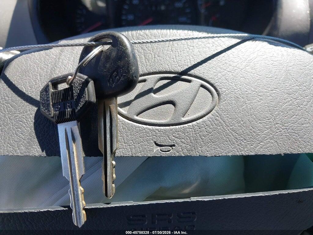 KMHCG45C62U332826 2002 HYUNDAI ACCENT photo no. 11