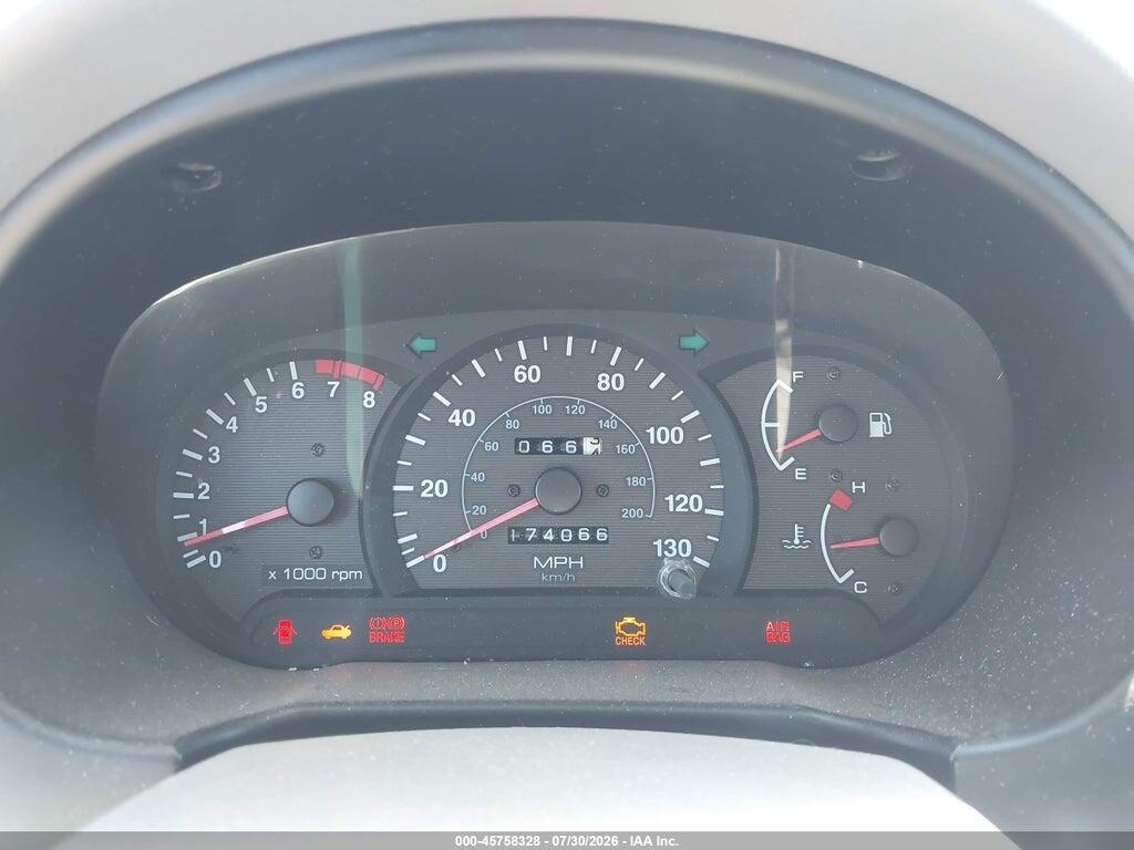 KMHCG45C62U332826 2002 HYUNDAI ACCENT photo no. 7