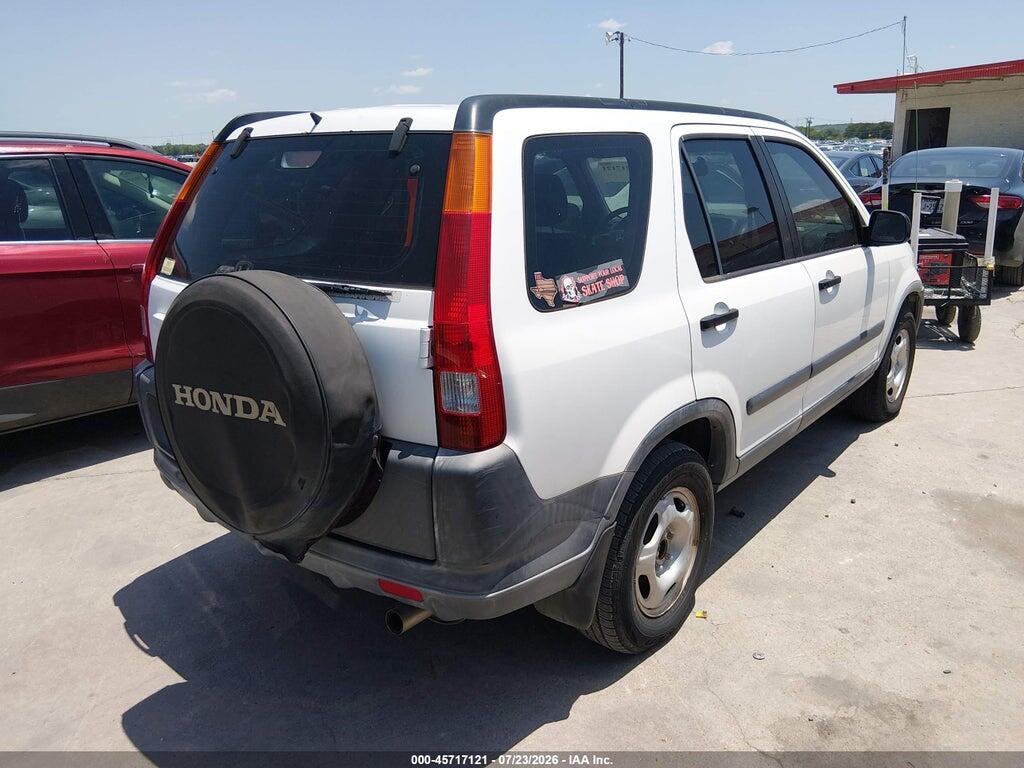 JHLRD68414C003079 2004 HONDA CR-V photo no. 4