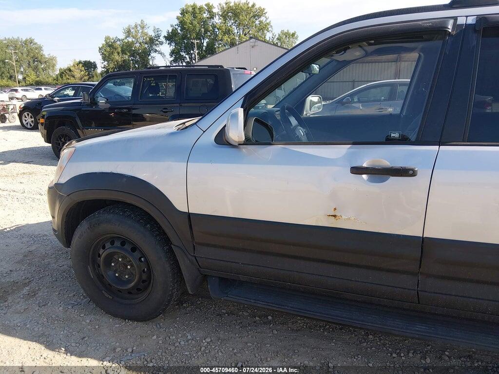 JHLRD77894C035658 2004 HONDA CR-V photo no. 6
