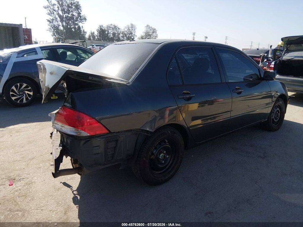 JA3AJ26E62U007917 2002 MITSUBISHI LANCER photo no. 4