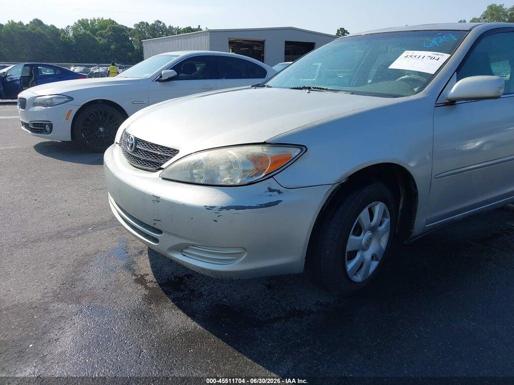 4T1BE32KX2U087052 2002 TOYOTA CAMRY photo no. 12
