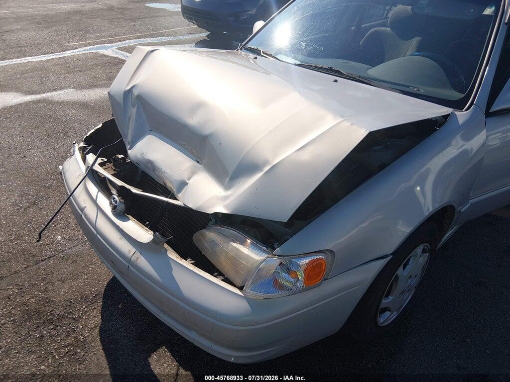 2T1BR12EXXC188474 1999 TOYOTA COROLLA photo no. 6