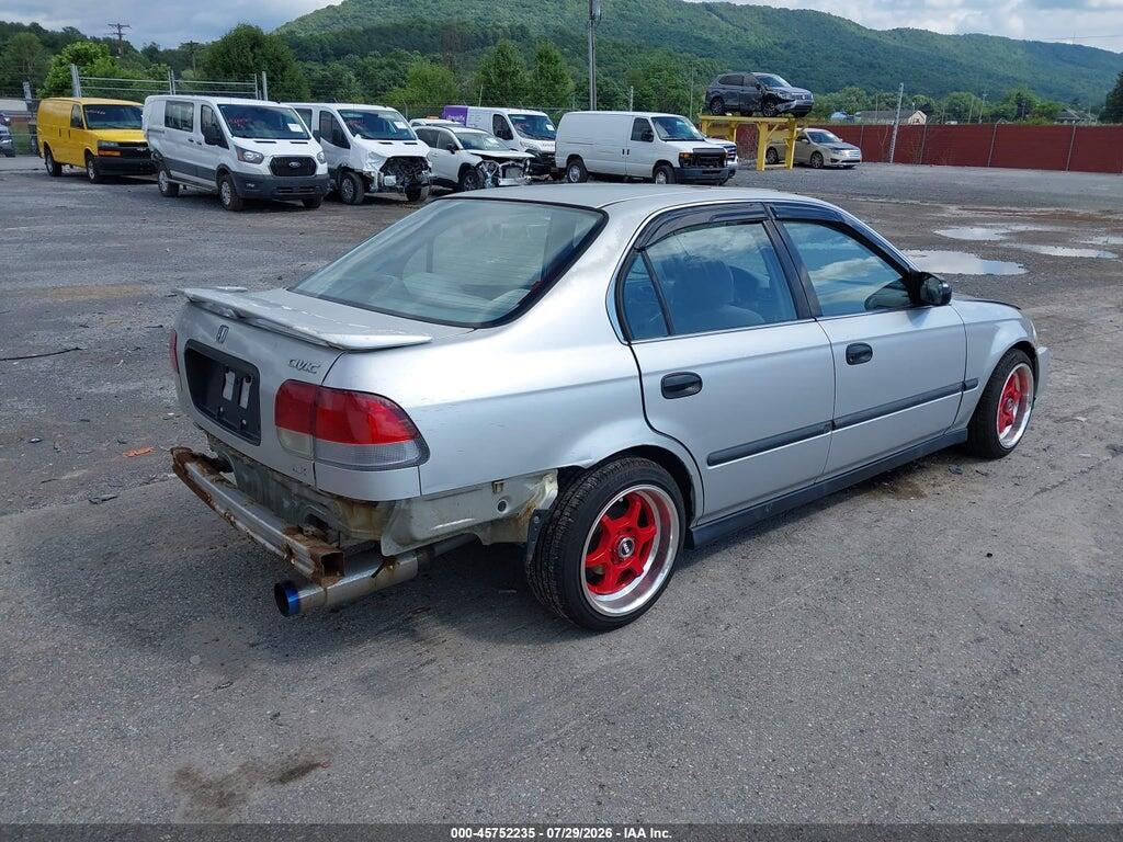 JHMEJ6579VS022097 1997 HONDA CIVIC photo no. 4