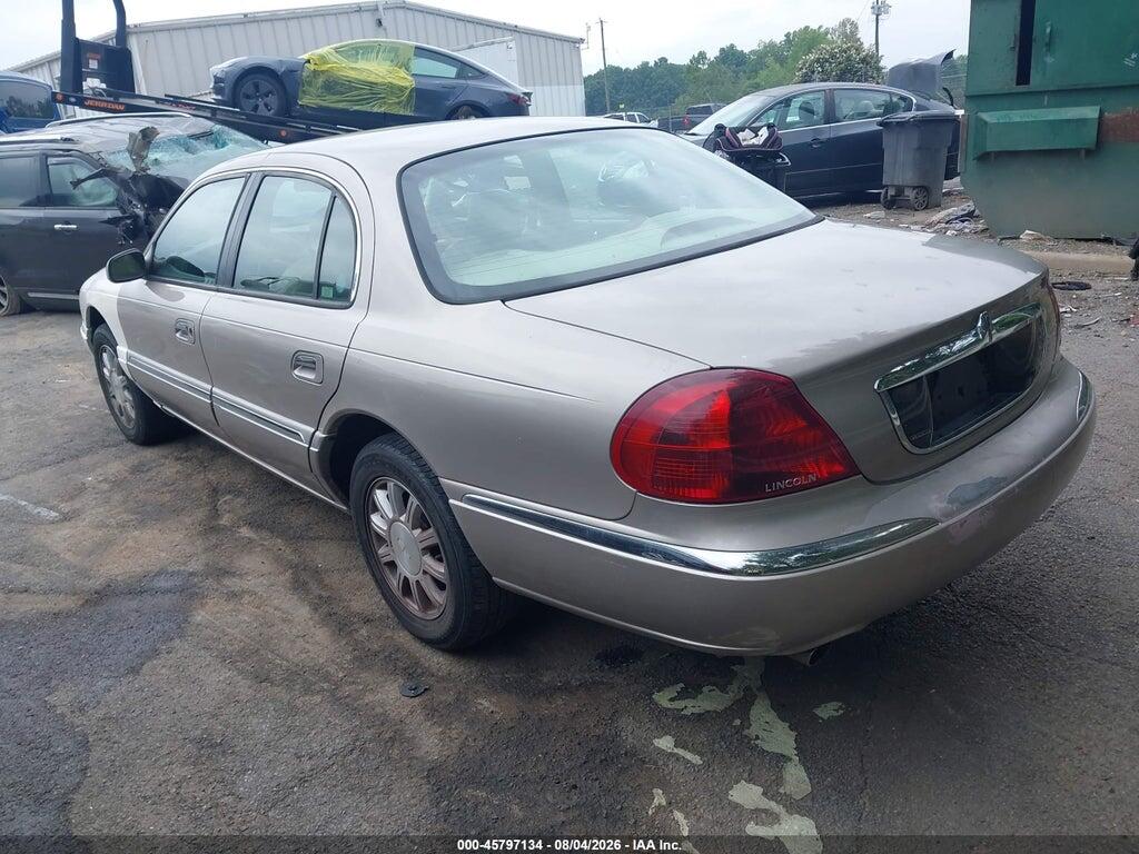 1LNHM97V7YY909844 2000 LINCOLN CONTINENTAL photo no. 3