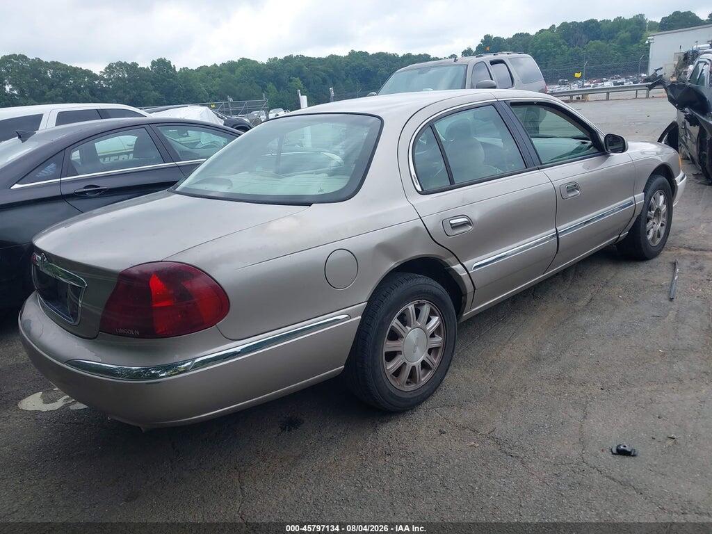 1LNHM97V7YY909844 2000 LINCOLN CONTINENTAL photo no. 4