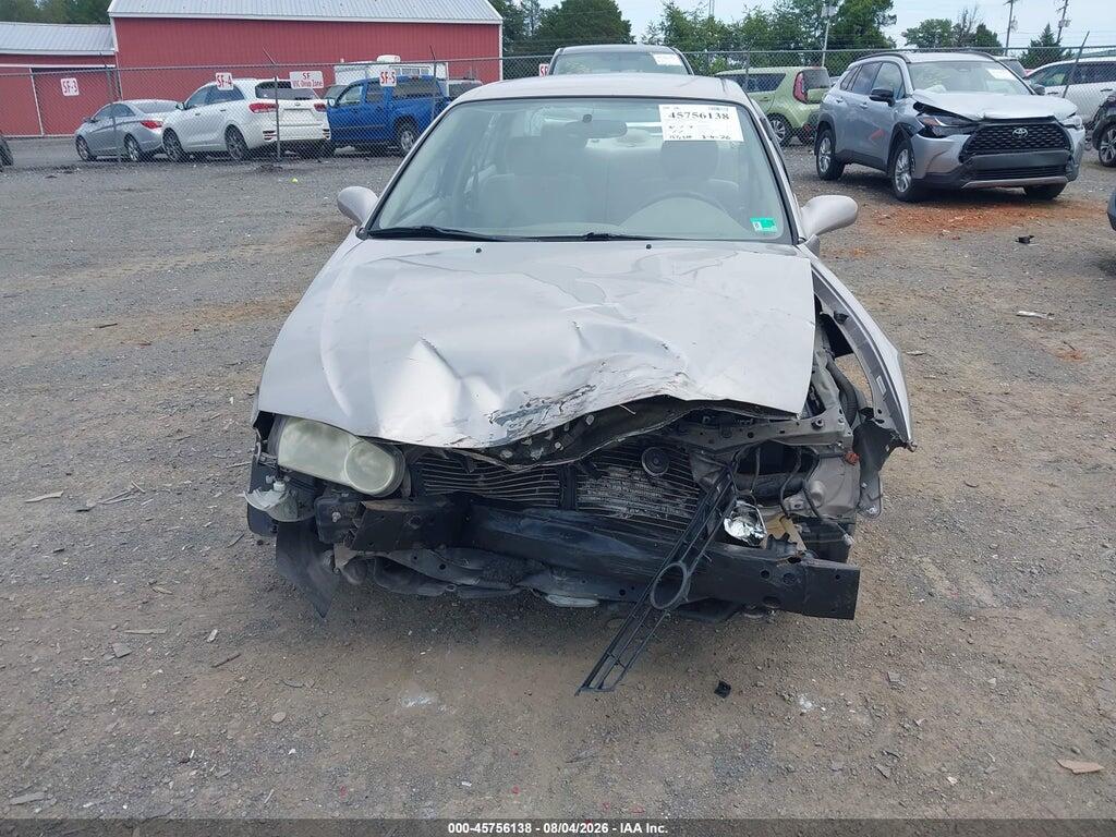 2T1BR12E32C577255 2002 TOYOTA COROLLA photo no. 6