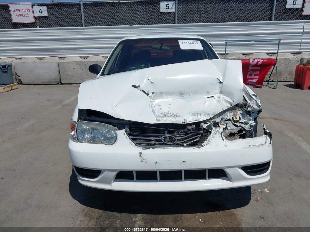 1NXBR12E52Z627698 2002 TOYOTA COROLLA photo no. 12
