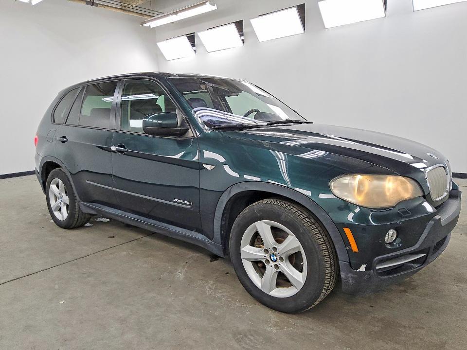 5UXFF0C56ALT75812 2010 BMW X5 photo no. 4