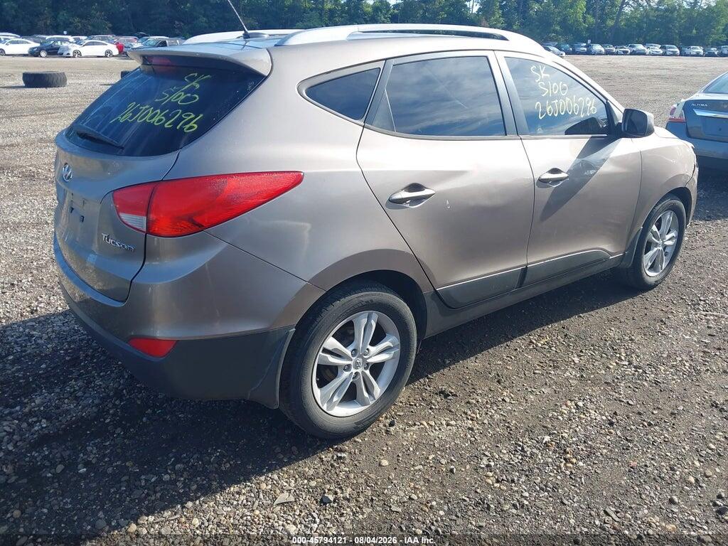 KM8JU3AC8BU185845 2011 HYUNDAI TUCSON photo no. 4
