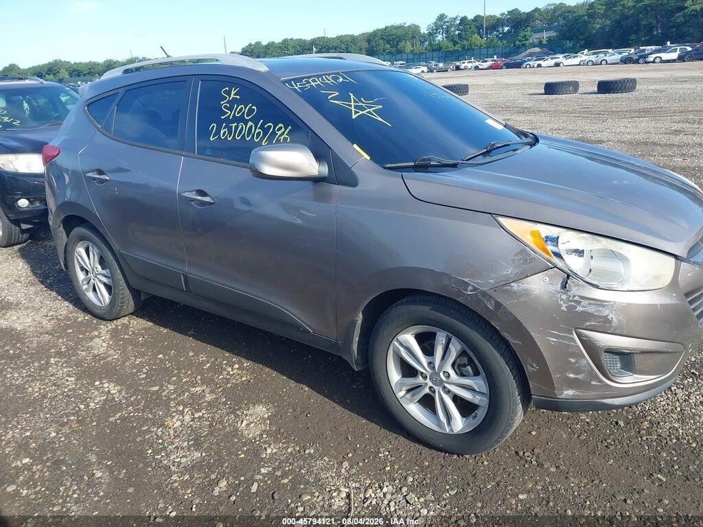 KM8JU3AC8BU185845 2011 HYUNDAI TUCSON photo no. 6