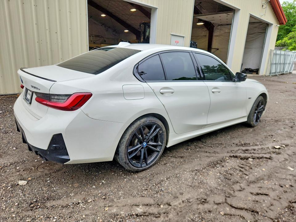 2023 BMW 330XE — Фото 3 из 12