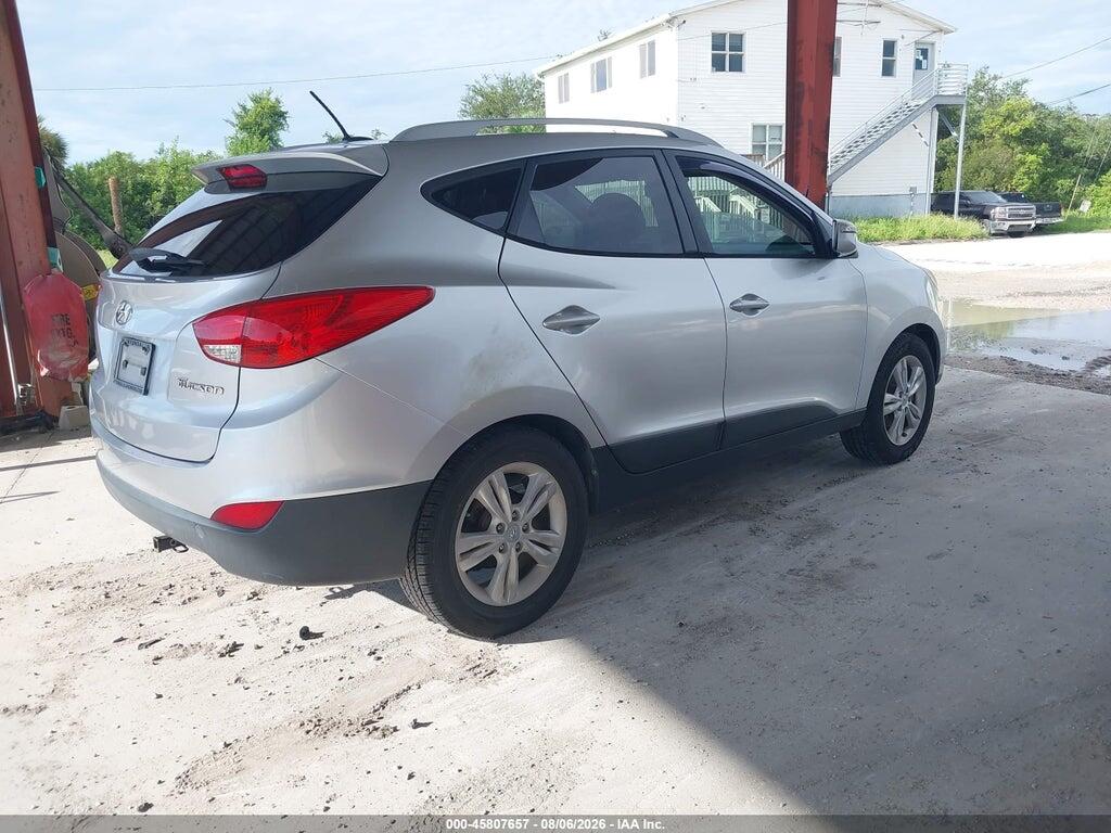 KM8JU3ACXCU499501 2012 HYUNDAI TUCSON photo no. 4