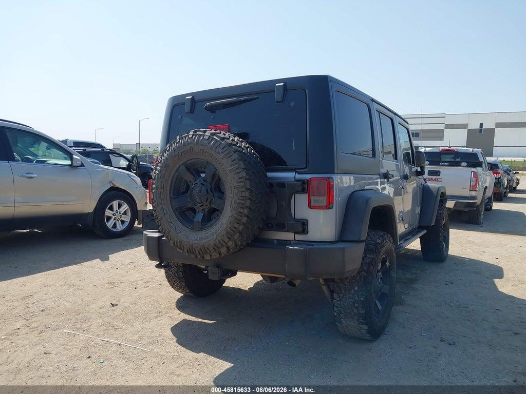 1C4BJWDG5EL208946 2014 JEEP WRANGLER UNLIMITED photo no. 4