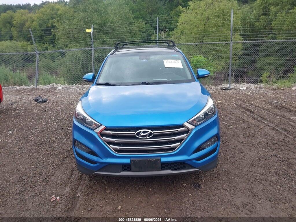 KM8J3CA29GU150975 2016 HYUNDAI TUCSON photo no. 12