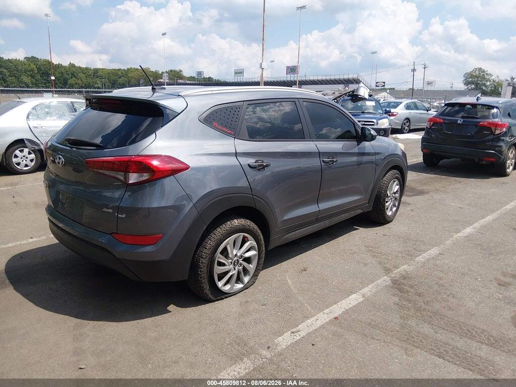 KM8J3CA40GU130020 2016 HYUNDAI TUCSON photo no. 4