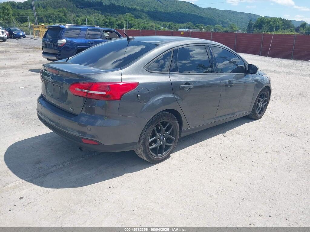 1FADP3F28GL390111 2016 FORD FOCUS photo no. 4