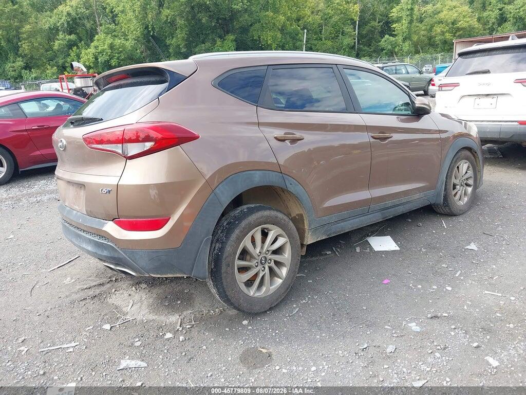 KM8J33A25GU098602 2016 HYUNDAI TUCSON photo no. 4