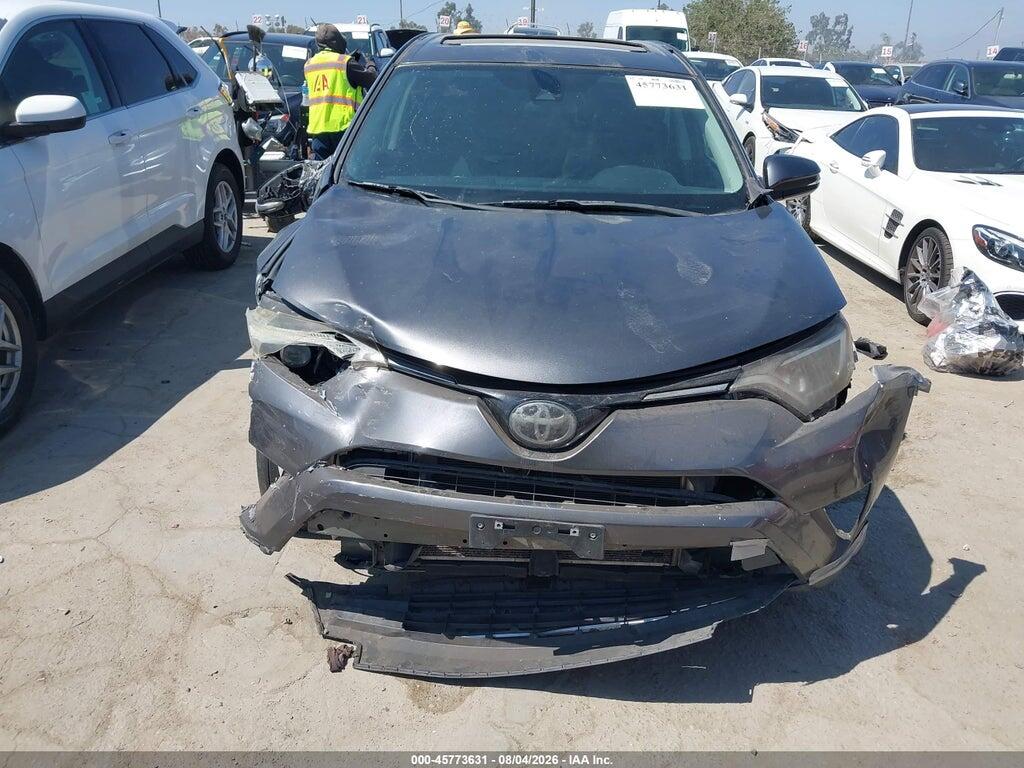 2T3RFREV9JW800923 2018 TOYOTA RAV4 photo no. 11