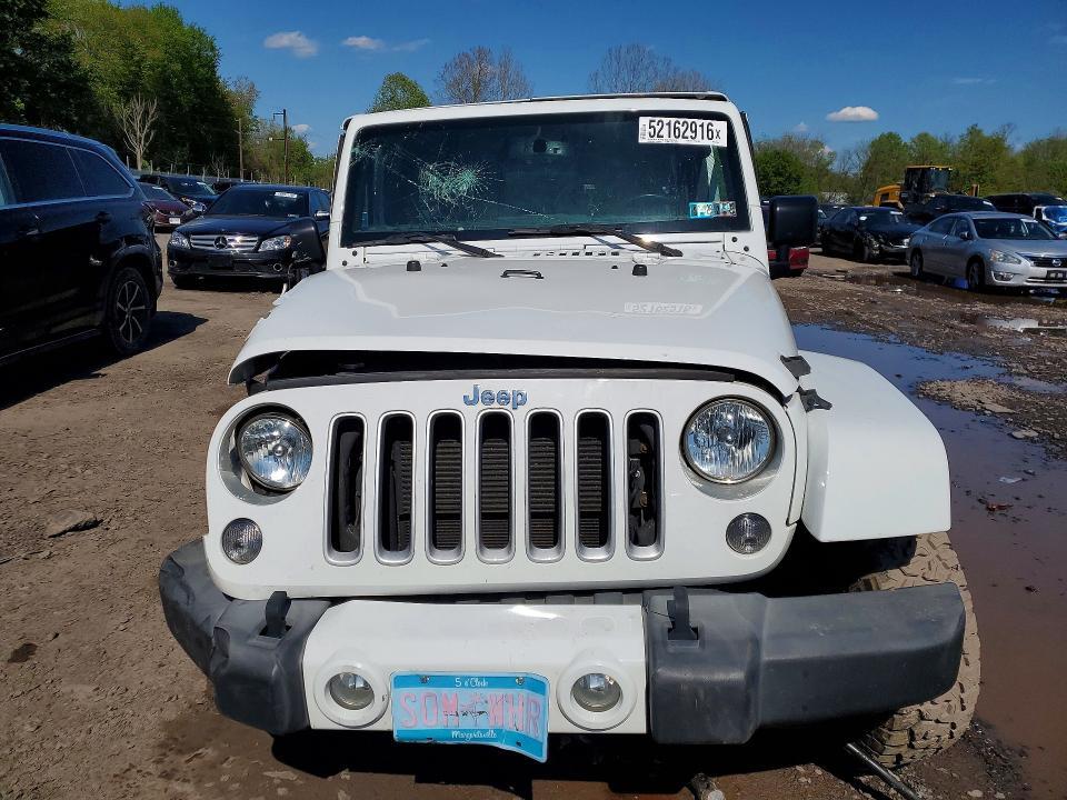 2016 JEEP WRANGLER UNLIMITED SAHARA — Фото 5 из 13