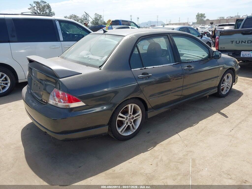 JA3AJ66FX4U045170 2004 MITSUBISHI LANCER photo no. 4
