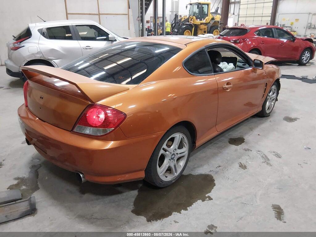 KMHHN65F66U205467 2006 HYUNDAI TIBURON photo no. 4