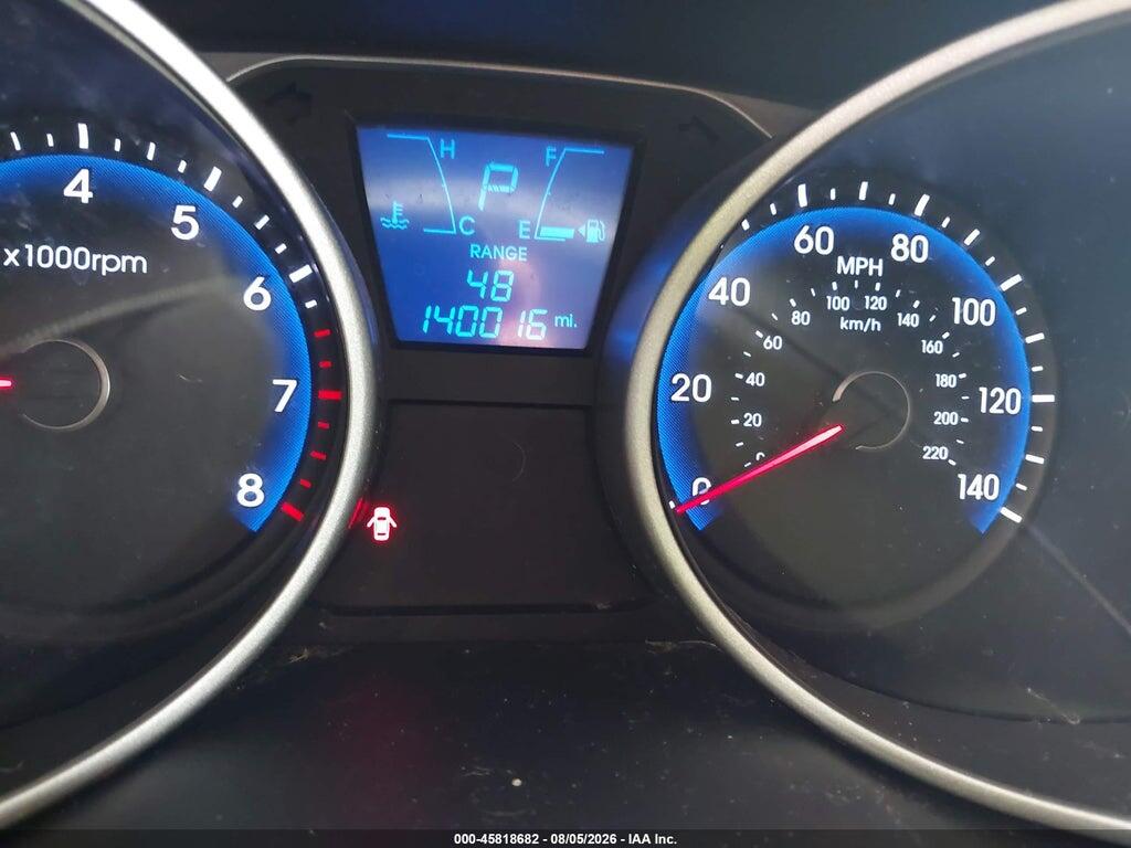KM8JT3AB7CU405049 2012 HYUNDAI TUCSON photo no. 7