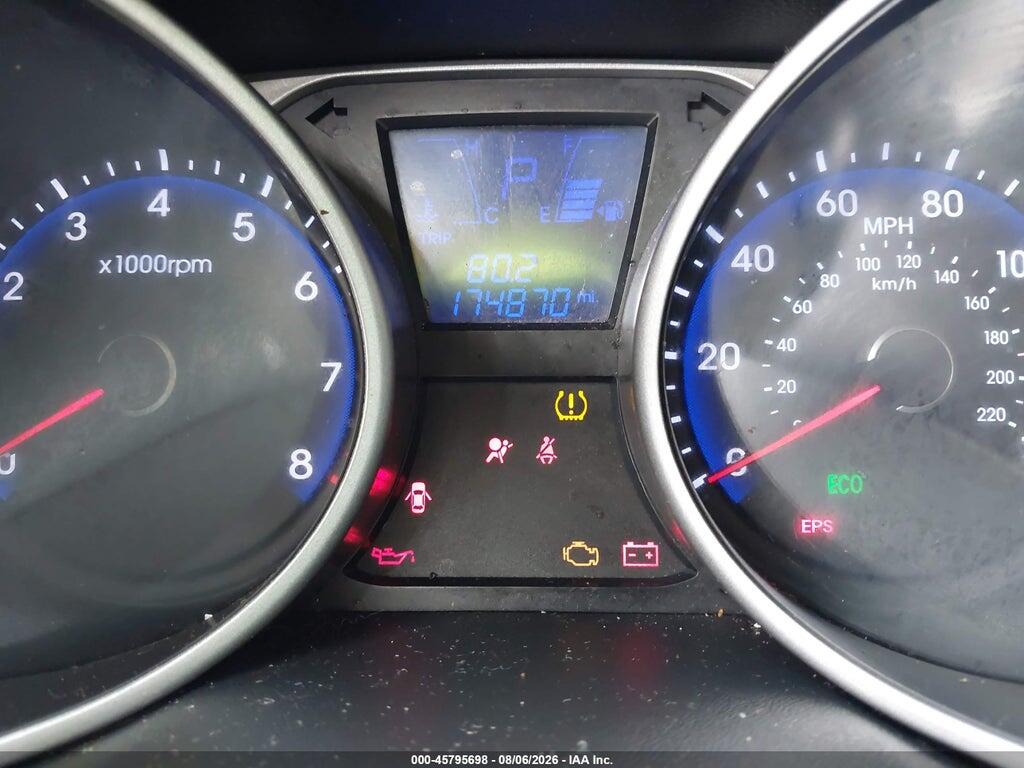 KM8JUCAC4CU419741 2012 HYUNDAI TUCSON photo no. 7