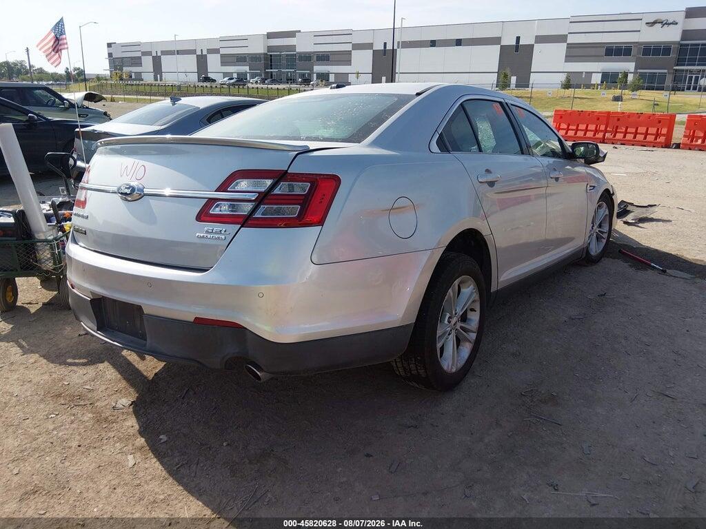 1FAHP2E89EG156065 2014 FORD TAURUS photo no. 4