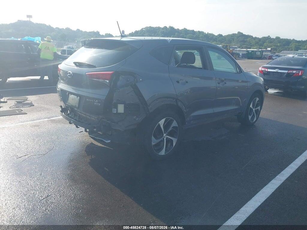KM8J3CA28GU147307 2016 HYUNDAI TUCSON photo no. 4
