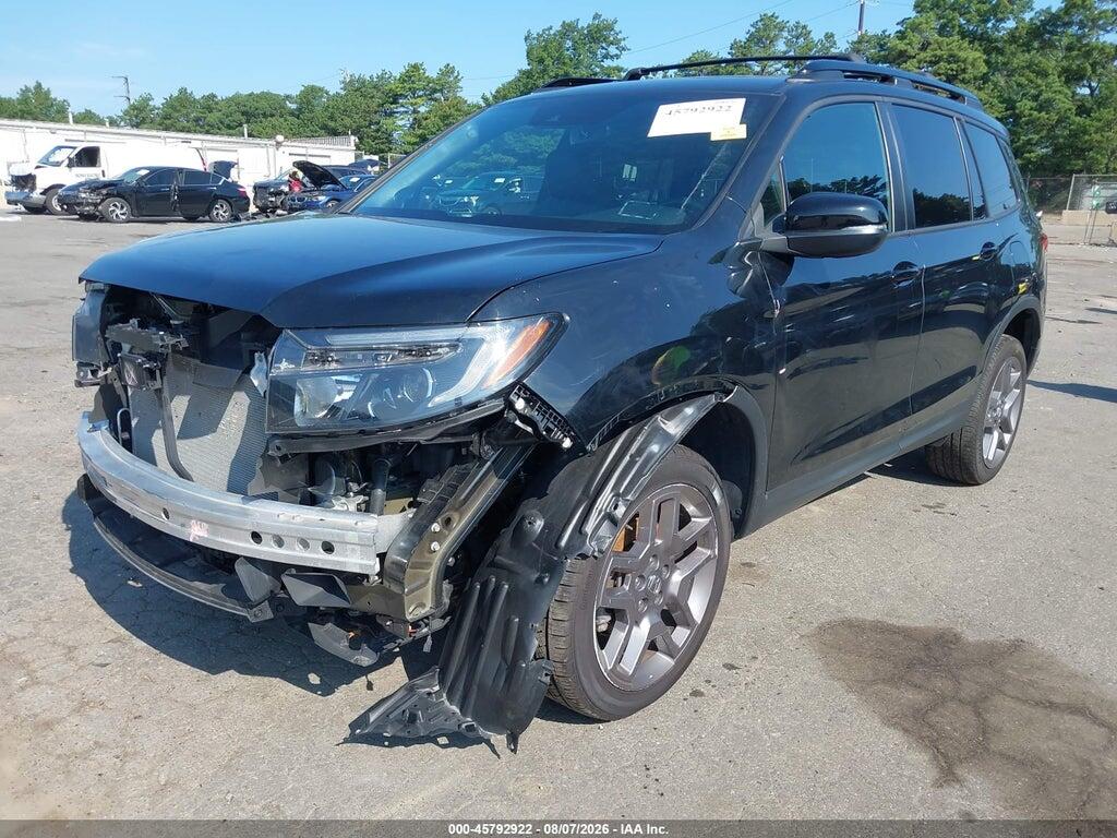 5FNYF8H50PB031342 2023 HONDA PASSPORT photo no. 2