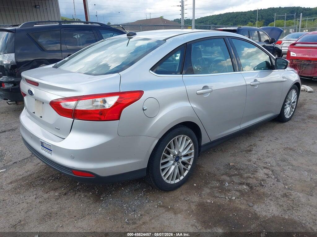 1FAHP3H29CL369664 2012 FORD FOCUS photo no. 4