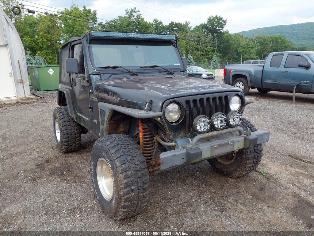 1J4FA29P7YP774519 2000 JEEP WRANGLER photo no. 6