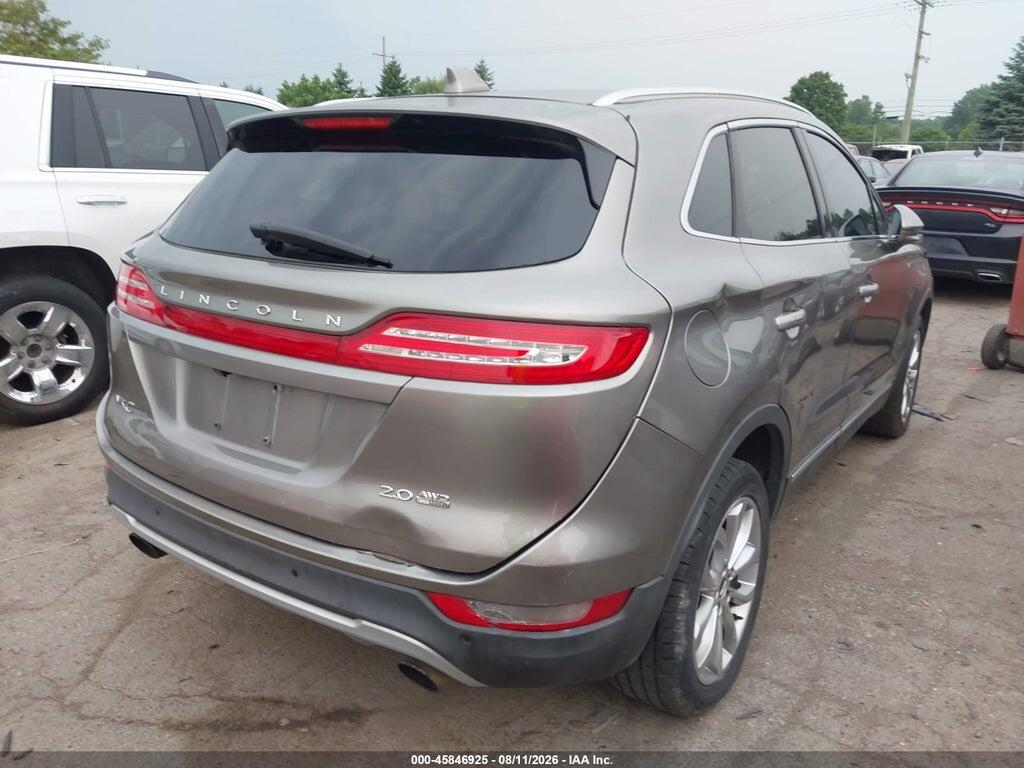 5LMCJ2D98GUJ31221 2016 LINCOLN MKC photo no. 4