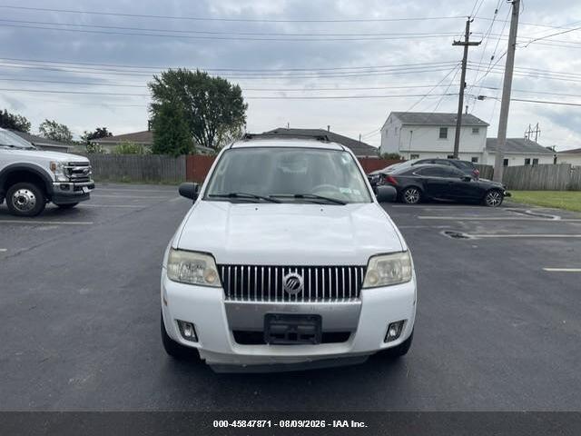4M2YU57105DJ14366 2005 MERCURY MARINER photo no. 4