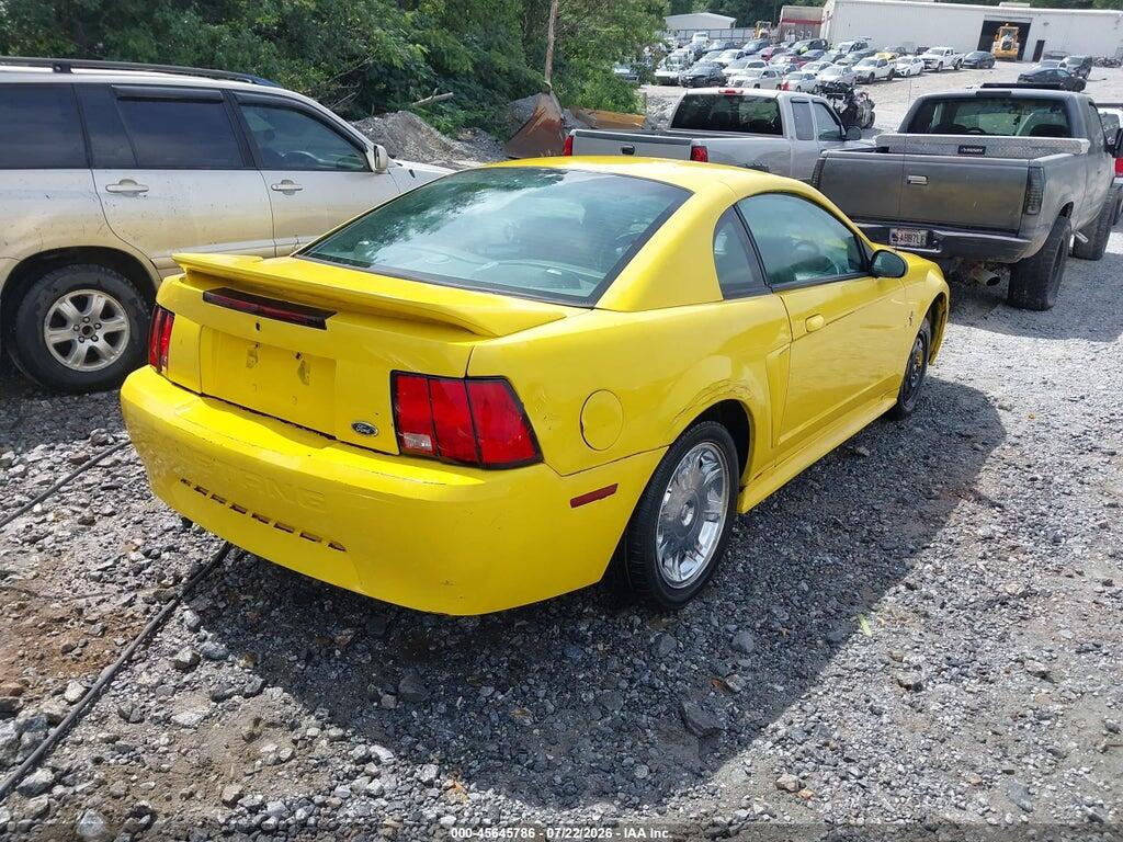 1FAFP4040YF310826 2000 FORD MUSTANG photo no. 4