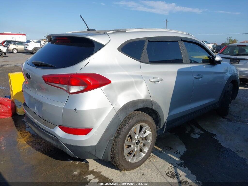KM8J33A45GU174143 2016 HYUNDAI TUCSON photo no. 4