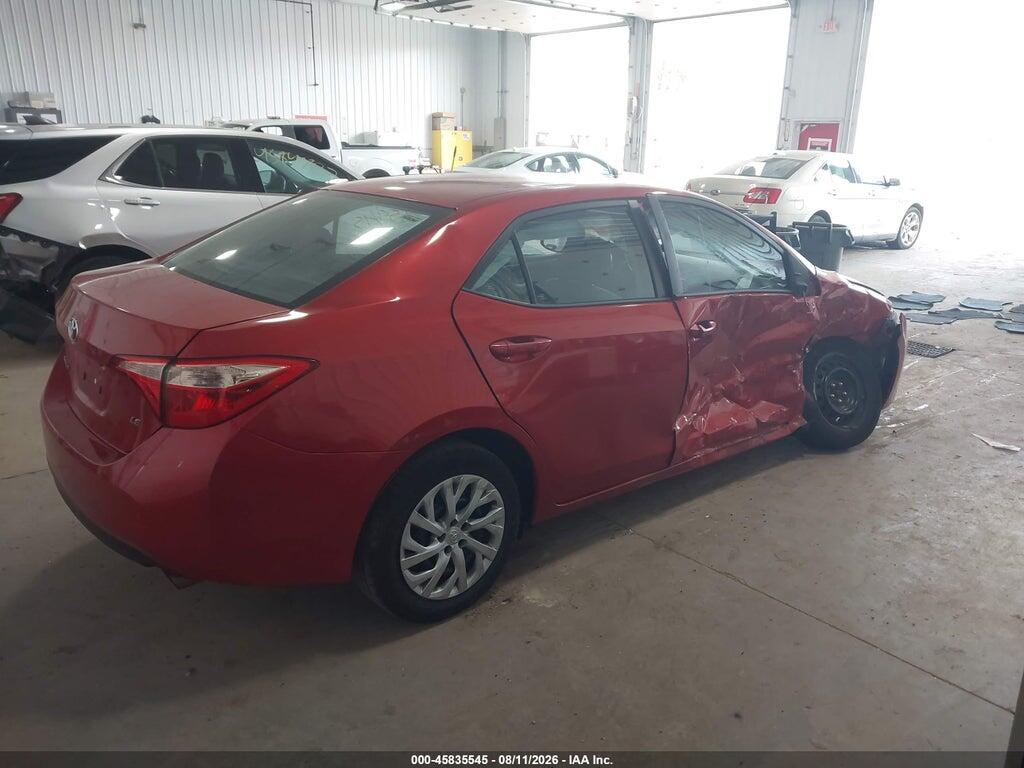 5YFBURHE9HP569299 2017 TOYOTA COROLLA photo no. 4
