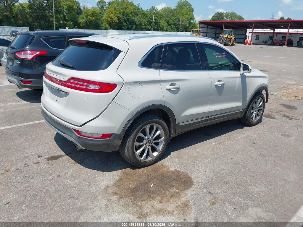 5LMCJ2C95KUL04476 2019 LINCOLN MKC photo no. 4