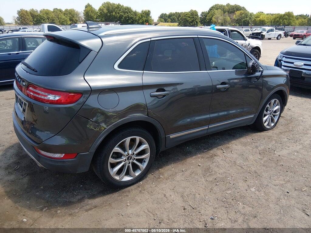 5LMCJ2C99KUL02939 2019 LINCOLN MKC photo no. 4
