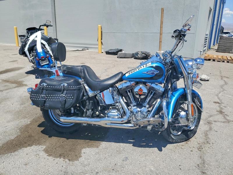 2011 HARLEY-DAVIDSON FLSTC 1HD1BW514BB014377