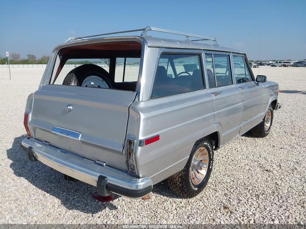 1JCNJ15U0HT080882 1987 JEEP GRAND WAGONEER photo no. 4