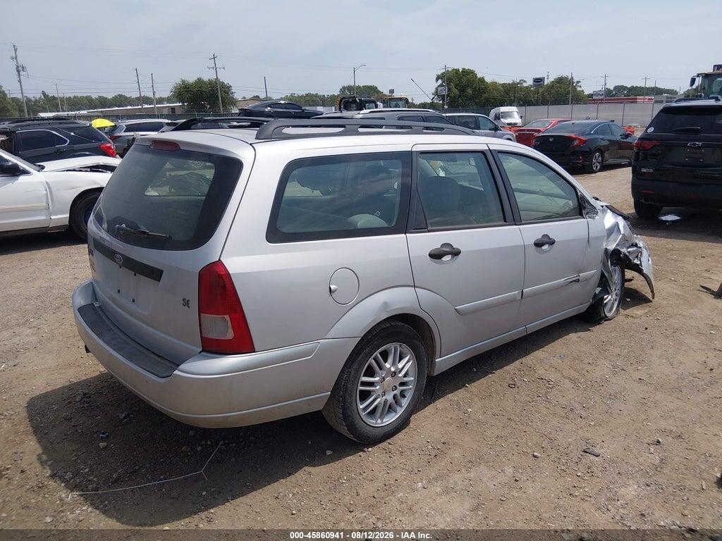 1FAHP36302W216552 2002 FORD FOCUS photo no. 4