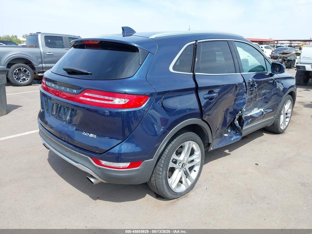 5LMCJ2A9XFUJ00698 2015 LINCOLN MKC photo no. 4