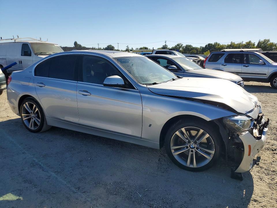 2017 BMW 330E — Фото 4 из 12