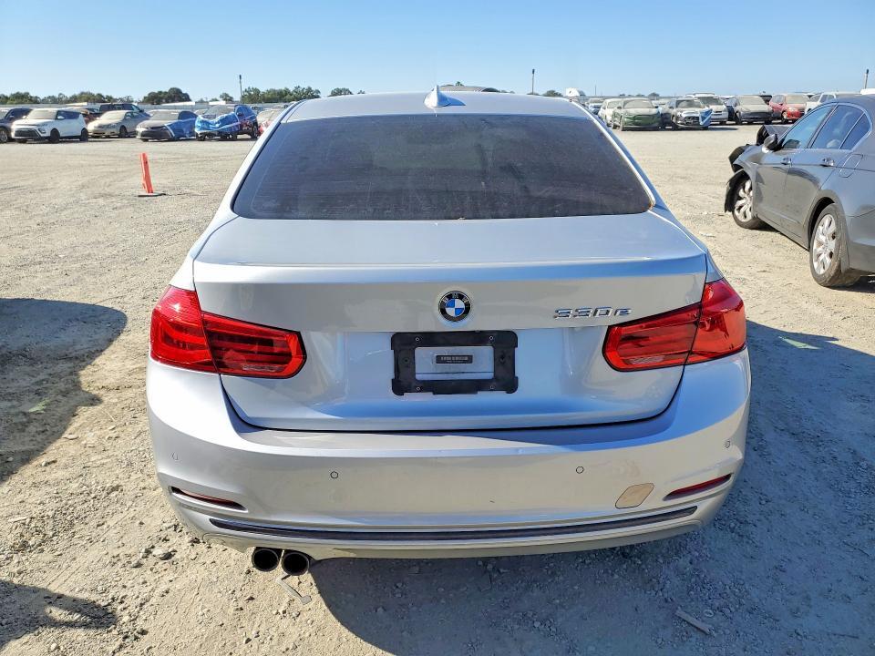 2017 BMW 330E — Фото 6 из 12